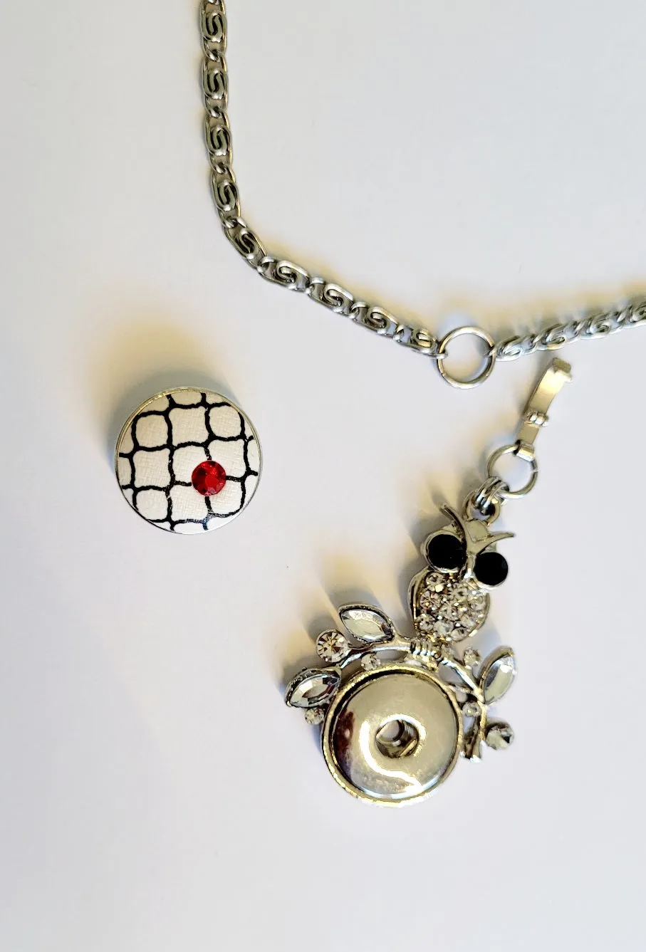 Necklace with detachable owl pendant and snap