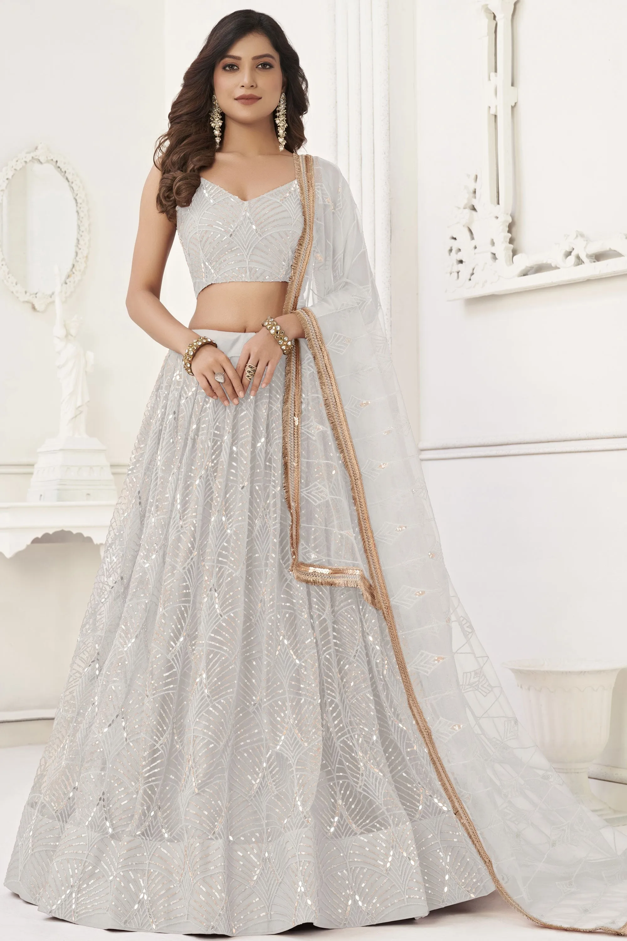 Off White Color Gorgeous Sangeet Wear Net Fabric Lehenga Choli